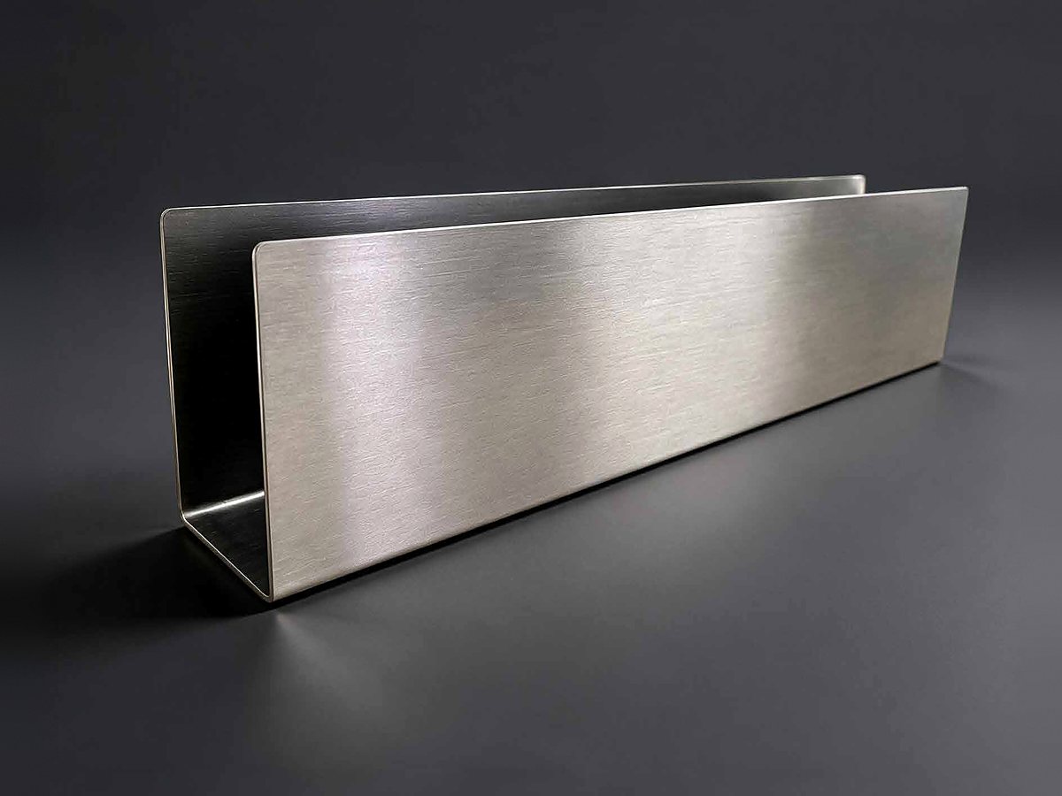 Upress stainless steel untuk membentuk kemasan saat proses packing